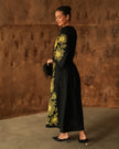 Side view of black linen kaftan maxi dress with bold gold floral embroidery and flared sleeves - Zalxndra Resort