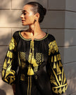 Black linen kaftan maxi dress with gold geometric embroidery, balloon sleeves and gold tassel ties, portrait view - Zalxndra Resort