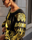Black linen kaftan maxi dress with gold geometric embroidery, balloon sleeves and gold tassel ties, sleeve detail view - Zalxndra Resort