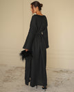 Back view of black linen kaftan maxi dress with tonal floral embroidery and frayed bell sleeves - Zalxndra Resort