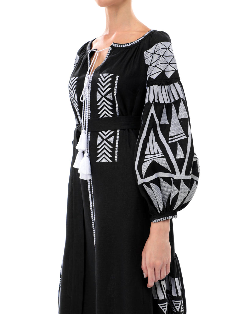 Black linen kaftan maxi dress with white geometric embroidery, balloon sleeves, white tassel ties and self-tie belt, embroidery detail view - Zalxndra Resort