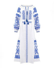 White linen kaftan maxi dress with blue geometric embroidery, balloon sleeves, tassel tie neckline and self-tie belt, front view - Zalxndra Resort