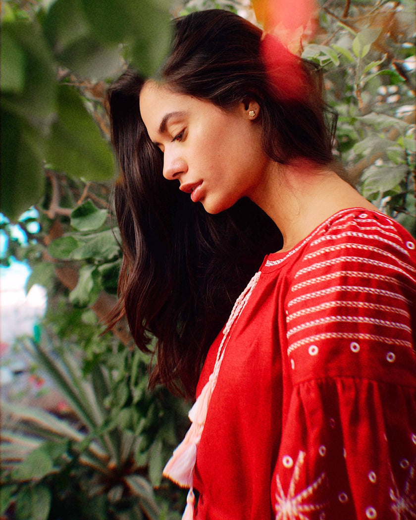 Cherry red linen kaftan maxi dress with white embroidery and balloon sleeves, bodice detail portrait view - Zalxndra Resort