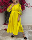 Lemon yellow linen kaftan maxi dress with black embroidery, balloon sleeves, button closure and self-tie belt, lifestyle view - Zalxndra Resort