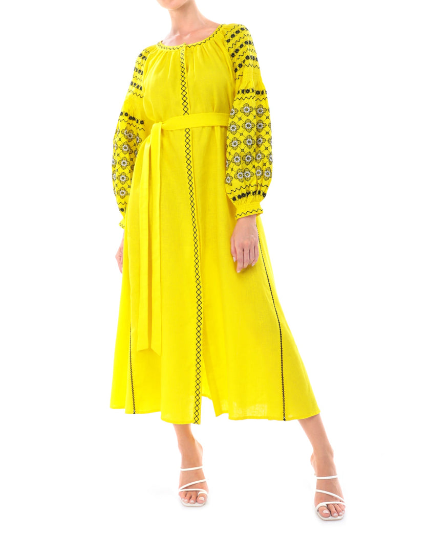 Lemon yellow linen kaftan maxi dress with black floral embroidery, balloon sleeves and self-tie belt, side profile view - Zalxndra Resort