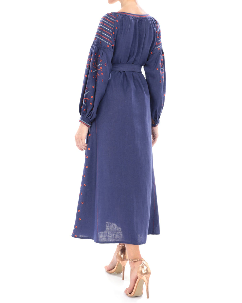 Back view of navy linen kaftan maxi dress with orange and blue geometric embroidery, balloon sleeves, and self-tie belt - Zalxndra Resort