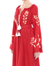 Scarlet red linen kaftan maxi dress with gold leaf embroidery, angel sleeves with frayed trim and white tassel ties, bodice detail view - Zalxndra Resort