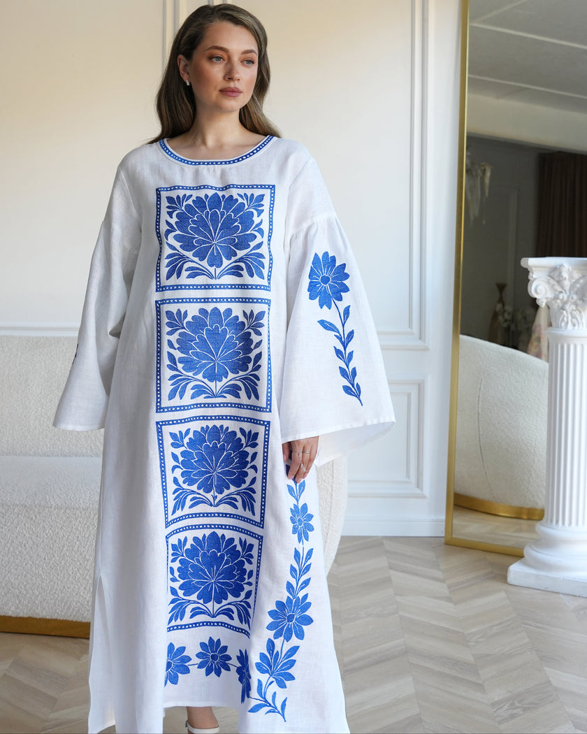 White linen kaftan maxi dress with cobalt blue floral embroidery and bell sleeves — Zalxndra Resort