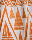 Close-up of orange geometric triangular embroidery on white linen kaftan maxi dress - Zalxndra Resort