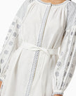 White linen kaftan maxi dress with slate geometric diamond embroidery, balloon sleeves and self-tie belt, embroidery detail view - Zalxndra Resort