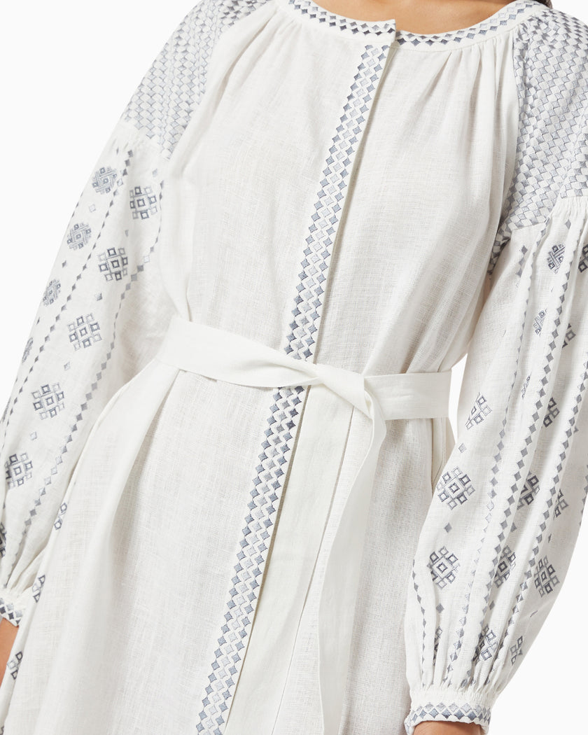 White linen kaftan maxi dress with slate geometric diamond embroidery, balloon sleeves and self-tie belt, embroidery detail view - Zalxndra Resort