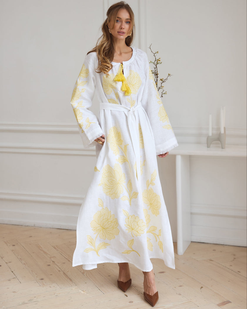 White linen kaftan maxi dress with yellow floral embroidery, angel sleeves, and tassel tie - Zalxndra Resort